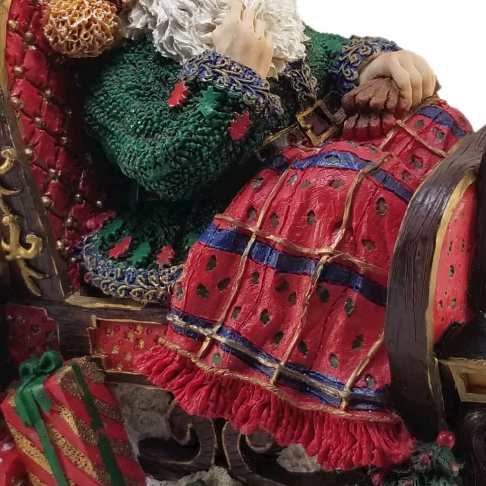 Santa in a Red Sleight Bed Resin Holiday Décor with Elves, Presents, And Toys - Picture 9 of 15